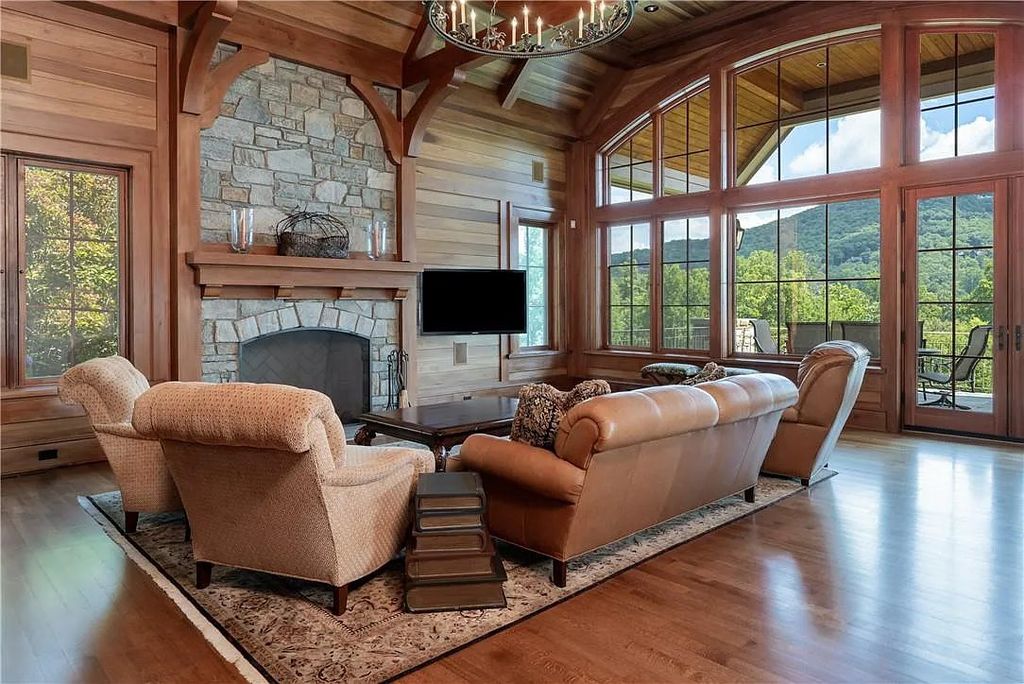 The Estate in Arden offers superb architectural features and radiates timeless elegance, now available for sale. This home located at 1322 Fawn Meadow Way, Arden, North Carolina