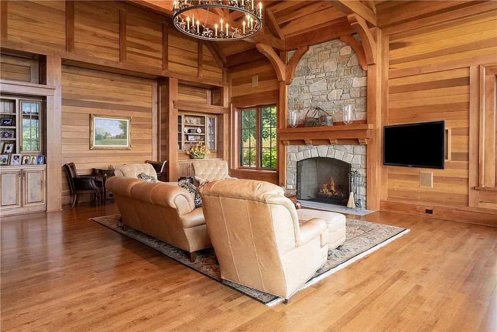 The Estate in Arden offers superb architectural features and radiates timeless elegance, now available for sale. This home located at 1322 Fawn Meadow Way, Arden, North Carolina