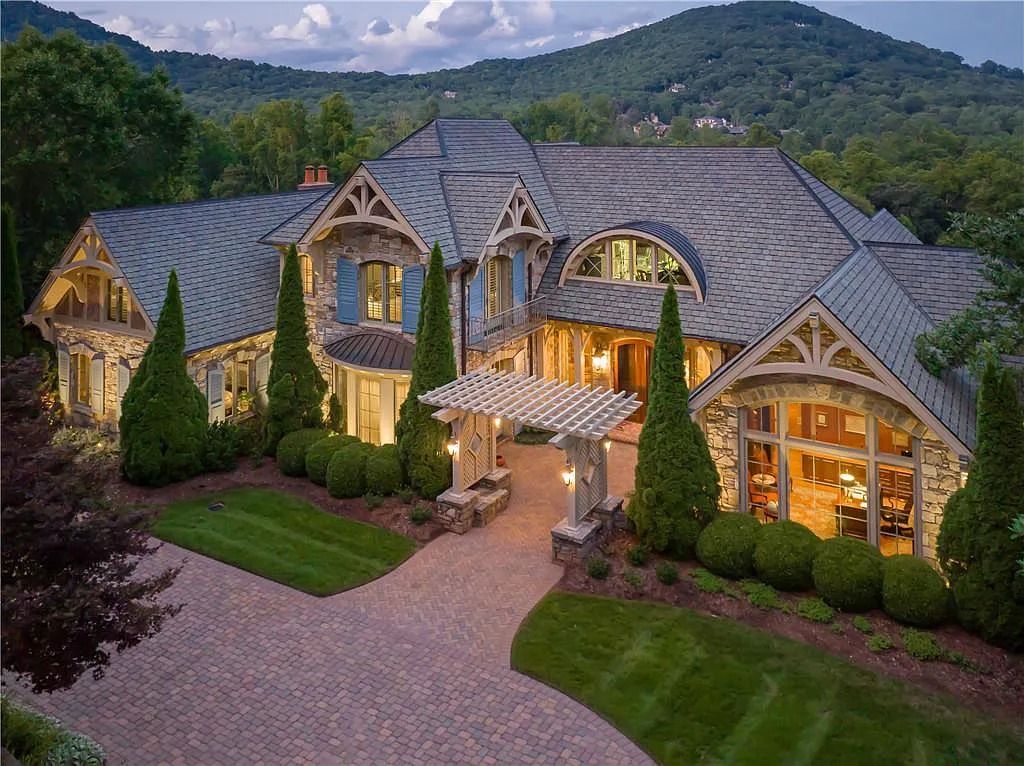 The Estate in Arden offers superb architectural features and radiates timeless elegance, now available for sale. This home located at 1322 Fawn Meadow Way, Arden, North Carolina