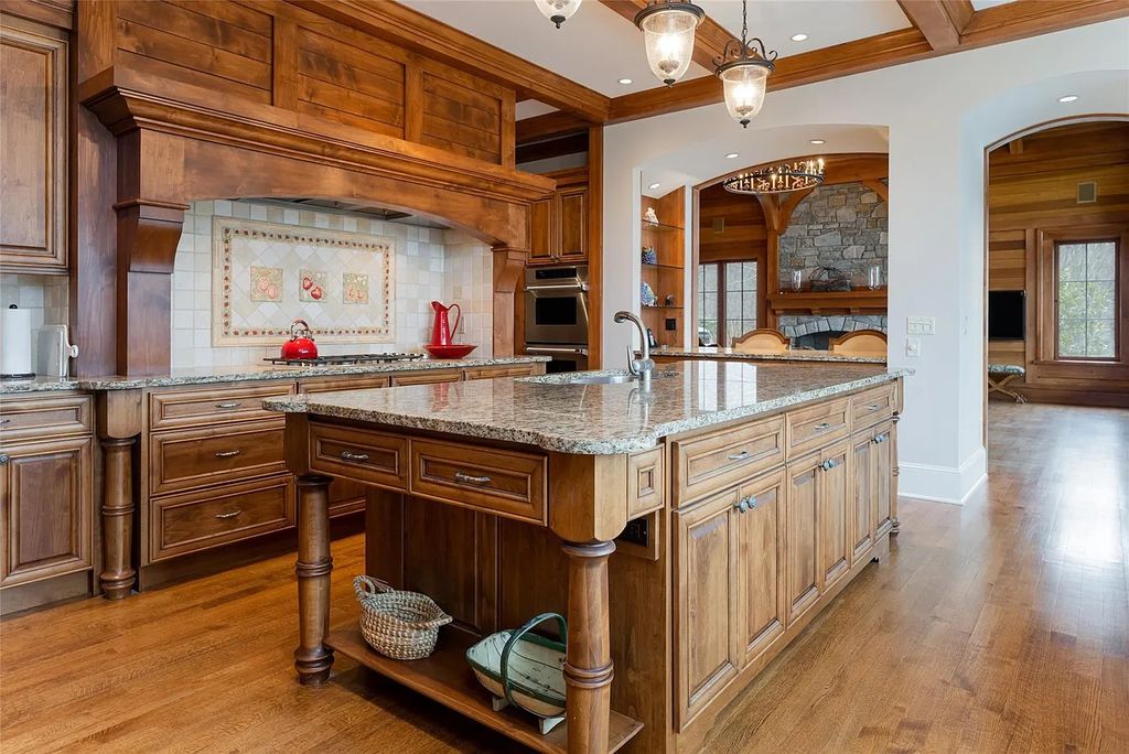 The Estate in Arden offers superb architectural features and radiates timeless elegance, now available for sale. This home located at 1322 Fawn Meadow Way, Arden, North Carolina