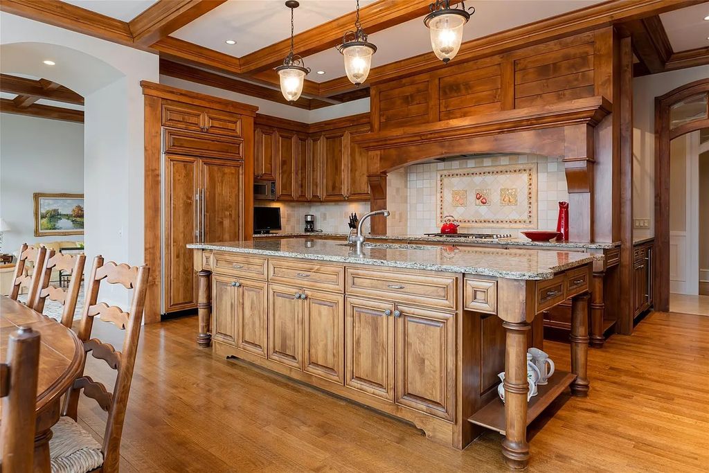 The Estate in Arden offers superb architectural features and radiates timeless elegance, now available for sale. This home located at 1322 Fawn Meadow Way, Arden, North Carolina