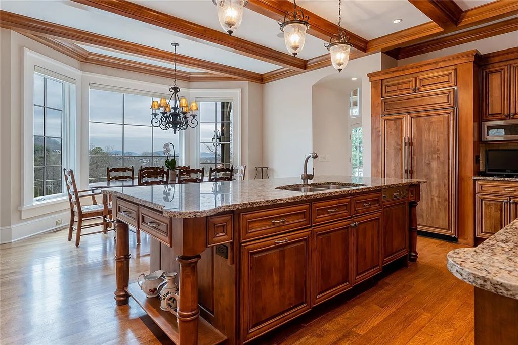 The Estate in Arden offers superb architectural features and radiates timeless elegance, now available for sale. This home located at 1322 Fawn Meadow Way, Arden, North Carolina