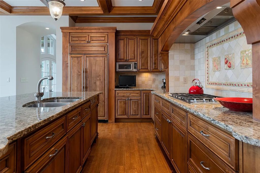The Estate in Arden offers superb architectural features and radiates timeless elegance, now available for sale. This home located at 1322 Fawn Meadow Way, Arden, North Carolina