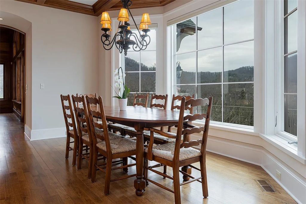 The Estate in Arden offers superb architectural features and radiates timeless elegance, now available for sale. This home located at 1322 Fawn Meadow Way, Arden, North Carolina