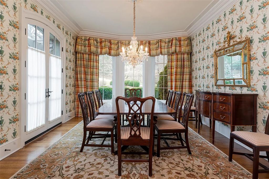 The Estate in Arden offers superb architectural features and radiates timeless elegance, now available for sale. This home located at 1322 Fawn Meadow Way, Arden, North Carolina