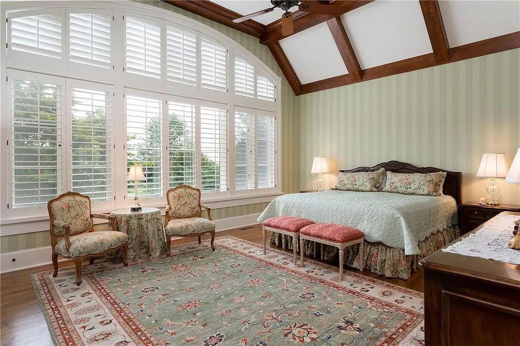 The Estate in Arden offers superb architectural features and radiates timeless elegance, now available for sale. This home located at 1322 Fawn Meadow Way, Arden, North Carolina