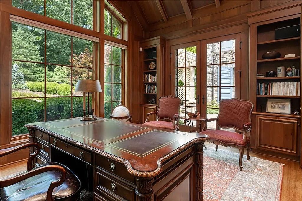 The Estate in Arden offers superb architectural features and radiates timeless elegance, now available for sale. This home located at 1322 Fawn Meadow Way, Arden, North Carolina
