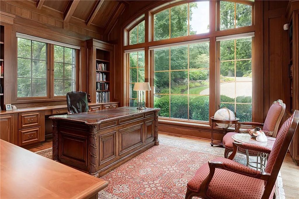 The Estate in Arden offers superb architectural features and radiates timeless elegance, now available for sale. This home located at 1322 Fawn Meadow Way, Arden, North Carolina