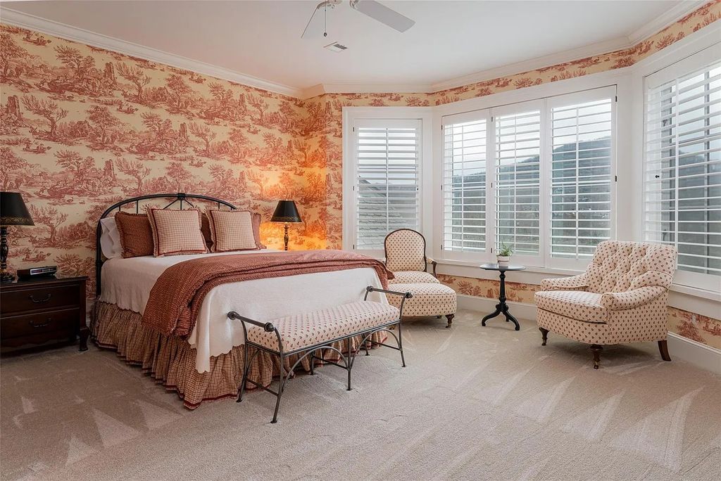 The Estate in Arden offers superb architectural features and radiates timeless elegance, now available for sale. This home located at 1322 Fawn Meadow Way, Arden, North Carolina