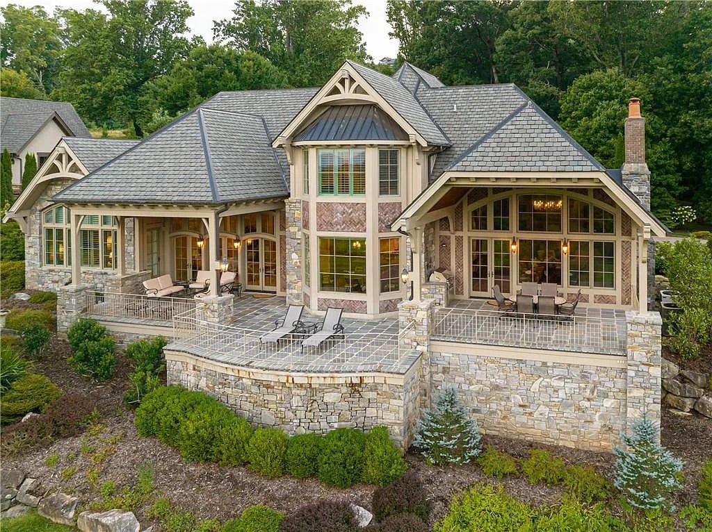 The Estate in Arden offers superb architectural features and radiates timeless elegance, now available for sale. This home located at 1322 Fawn Meadow Way, Arden, North Carolina