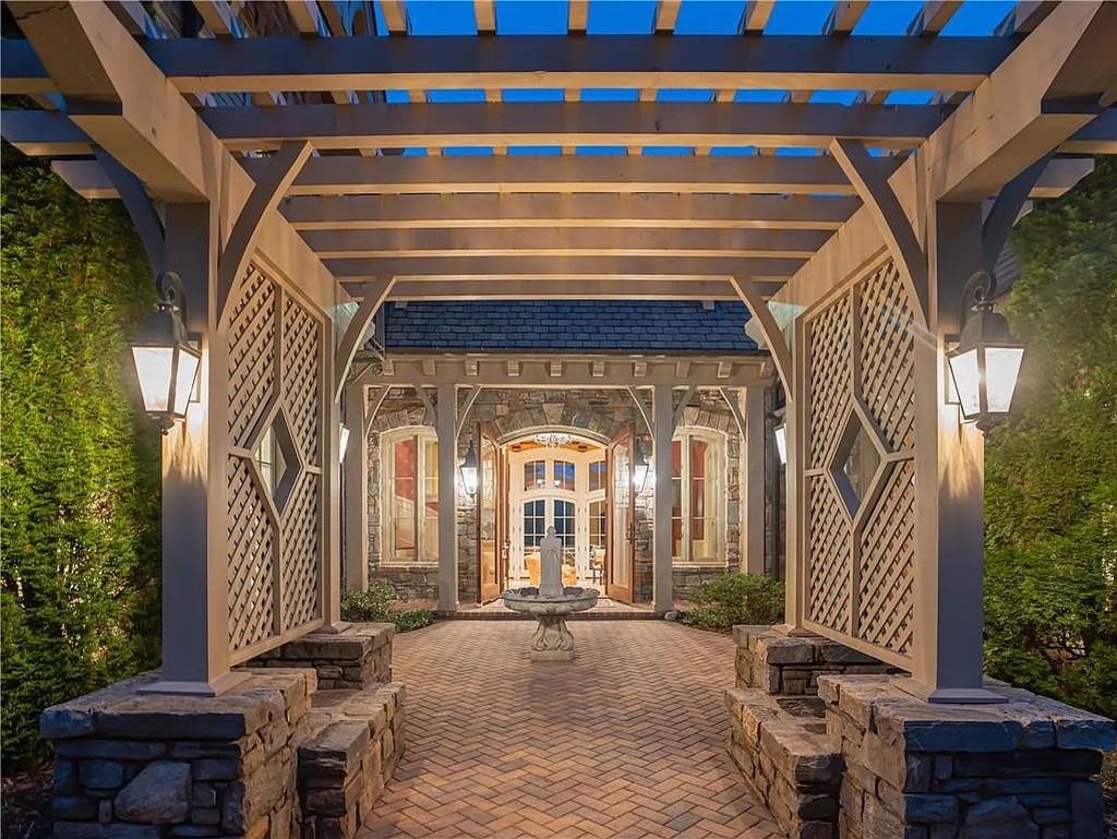 The Estate in Arden offers superb architectural features and radiates timeless elegance, now available for sale. This home located at 1322 Fawn Meadow Way, Arden, North Carolina