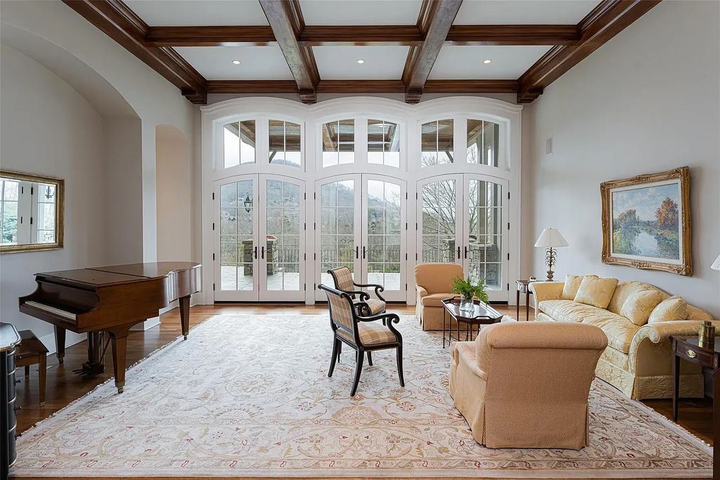 The Estate in Arden offers superb architectural features and radiates timeless elegance, now available for sale. This home located at 1322 Fawn Meadow Way, Arden, North Carolina