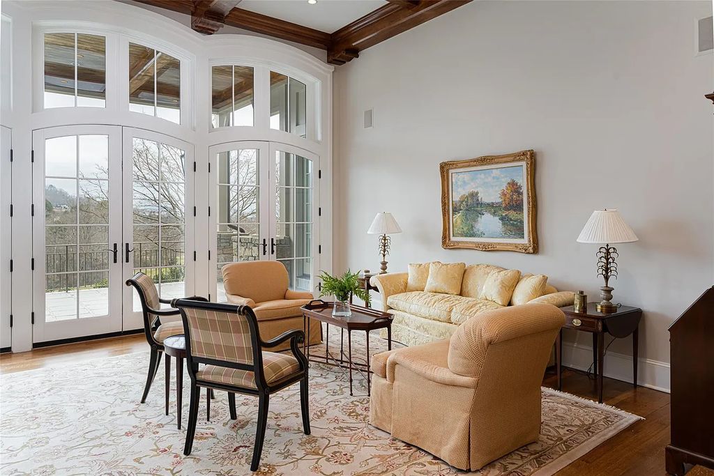 The Estate in Arden offers superb architectural features and radiates timeless elegance, now available for sale. This home located at 1322 Fawn Meadow Way, Arden, North Carolina