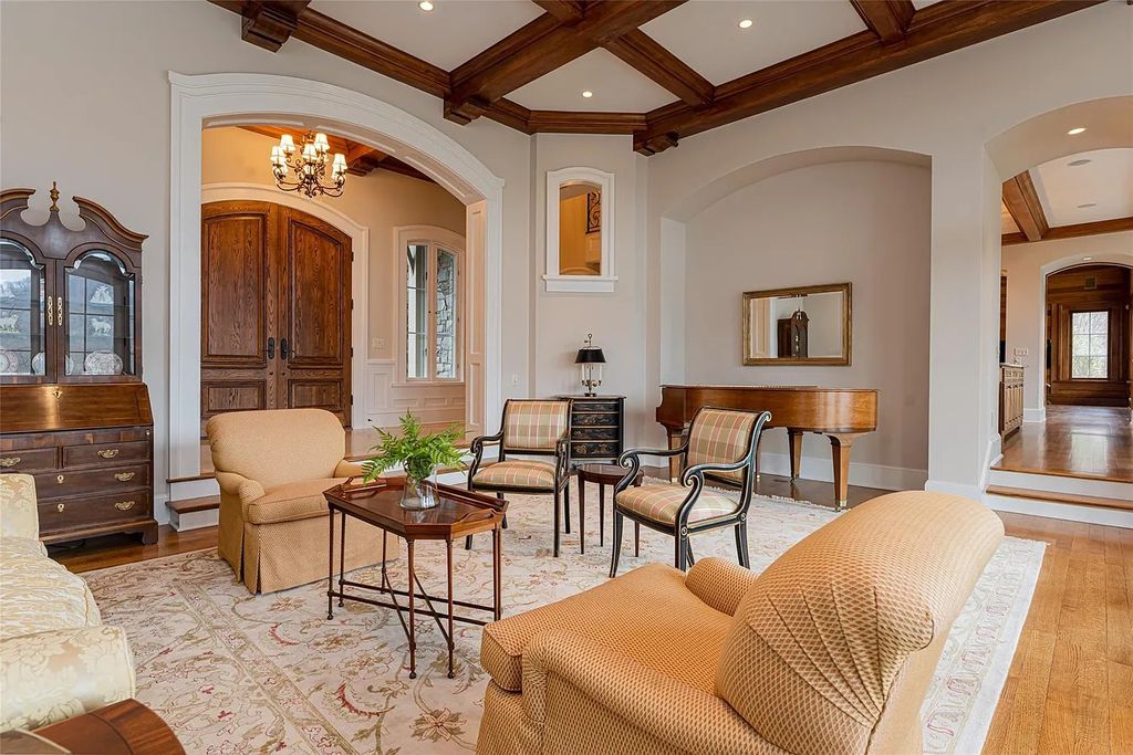 The Estate in Arden offers superb architectural features and radiates timeless elegance, now available for sale. This home located at 1322 Fawn Meadow Way, Arden, North Carolina