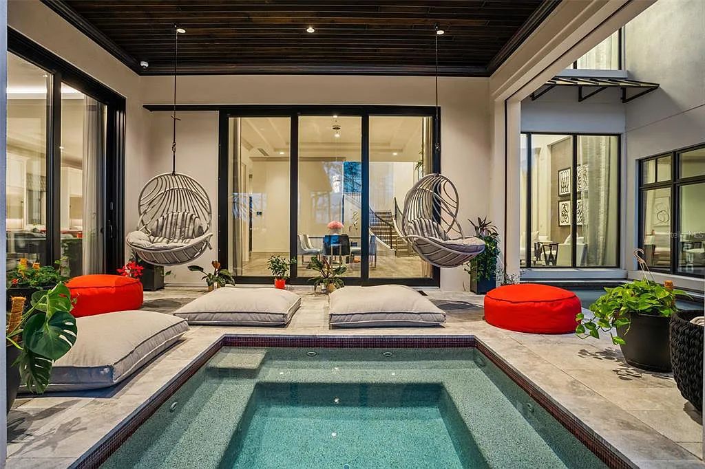 This luxurious lakefront mansion at 9306 Blanche Cove Drive in Windermere, Florida, is a custom-crafted masterpiece built for the ultimate sports enthusiast. The 5-bedroom, 8-bath home spans 14,856 square feet and includes a 6,060 square foot air-conditioned full-sized basketball court, a theater, an exercise room with sauna, and a two-story master closet.