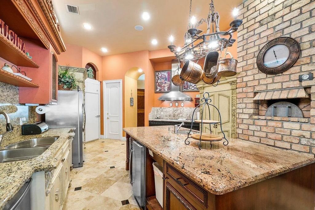 Introducing a stunning house at 14 E Ocean Avenue, located in the highly sought-after area of Boynton Beach, Florida. This luxurious property boasts 6 spacious bedrooms and 7 modern bathrooms, perfect for accommodating large families or hosting guests.