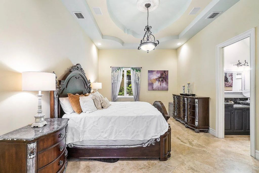 Introducing a stunning house at 14 E Ocean Avenue, located in the highly sought-after area of Boynton Beach, Florida. This luxurious property boasts 6 spacious bedrooms and 7 modern bathrooms, perfect for accommodating large families or hosting guests.