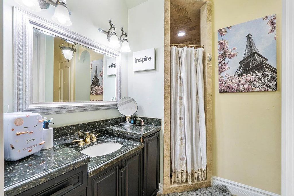 Introducing a stunning house at 14 E Ocean Avenue, located in the highly sought-after area of Boynton Beach, Florida. This luxurious property boasts 6 spacious bedrooms and 7 modern bathrooms, perfect for accommodating large families or hosting guests.