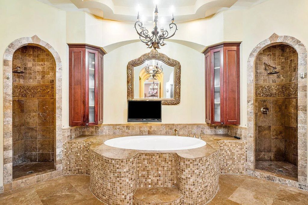Introducing a stunning house at 14 E Ocean Avenue, located in the highly sought-after area of Boynton Beach, Florida. This luxurious property boasts 6 spacious bedrooms and 7 modern bathrooms, perfect for accommodating large families or hosting guests.