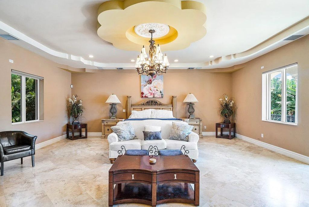 Introducing a stunning house at 14 E Ocean Avenue, located in the highly sought-after area of Boynton Beach, Florida. This luxurious property boasts 6 spacious bedrooms and 7 modern bathrooms, perfect for accommodating large families or hosting guests.
