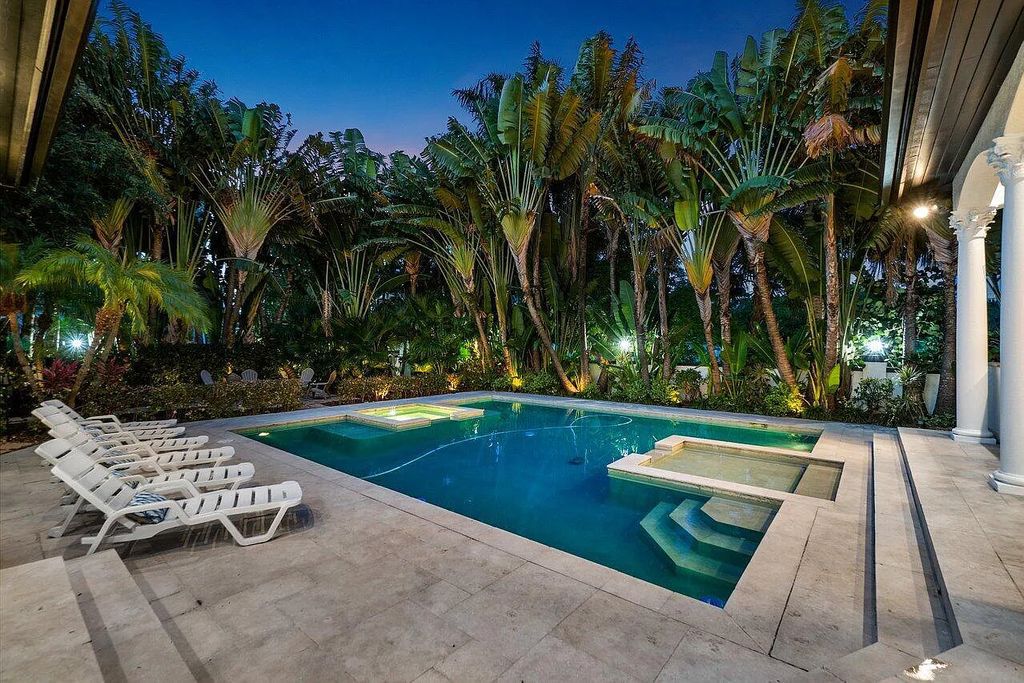 Introducing a stunning house at 14 E Ocean Avenue, located in the highly sought-after area of Boynton Beach, Florida. This luxurious property boasts 6 spacious bedrooms and 7 modern bathrooms, perfect for accommodating large families or hosting guests.