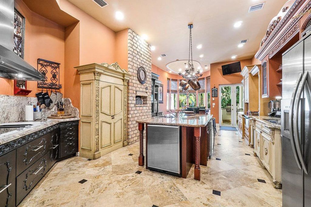 Introducing a stunning house at 14 E Ocean Avenue, located in the highly sought-after area of Boynton Beach, Florida. This luxurious property boasts 6 spacious bedrooms and 7 modern bathrooms, perfect for accommodating large families or hosting guests.