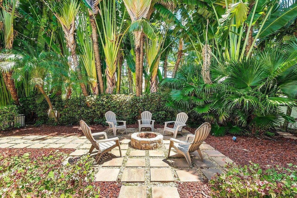 Introducing a stunning house at 14 E Ocean Avenue, located in the highly sought-after area of Boynton Beach, Florida. This luxurious property boasts 6 spacious bedrooms and 7 modern bathrooms, perfect for accommodating large families or hosting guests.