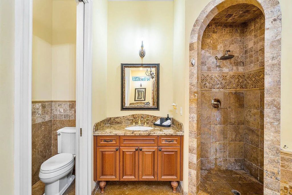 Introducing a stunning house at 14 E Ocean Avenue, located in the highly sought-after area of Boynton Beach, Florida. This luxurious property boasts 6 spacious bedrooms and 7 modern bathrooms, perfect for accommodating large families or hosting guests.