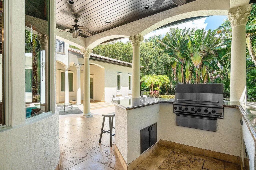 Introducing a stunning house at 14 E Ocean Avenue, located in the highly sought-after area of Boynton Beach, Florida. This luxurious property boasts 6 spacious bedrooms and 7 modern bathrooms, perfect for accommodating large families or hosting guests.
