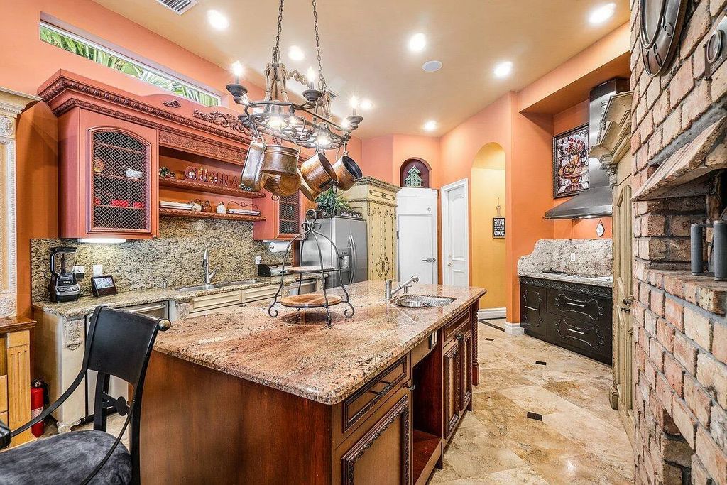 Introducing a stunning house at 14 E Ocean Avenue, located in the highly sought-after area of Boynton Beach, Florida. This luxurious property boasts 6 spacious bedrooms and 7 modern bathrooms, perfect for accommodating large families or hosting guests.
