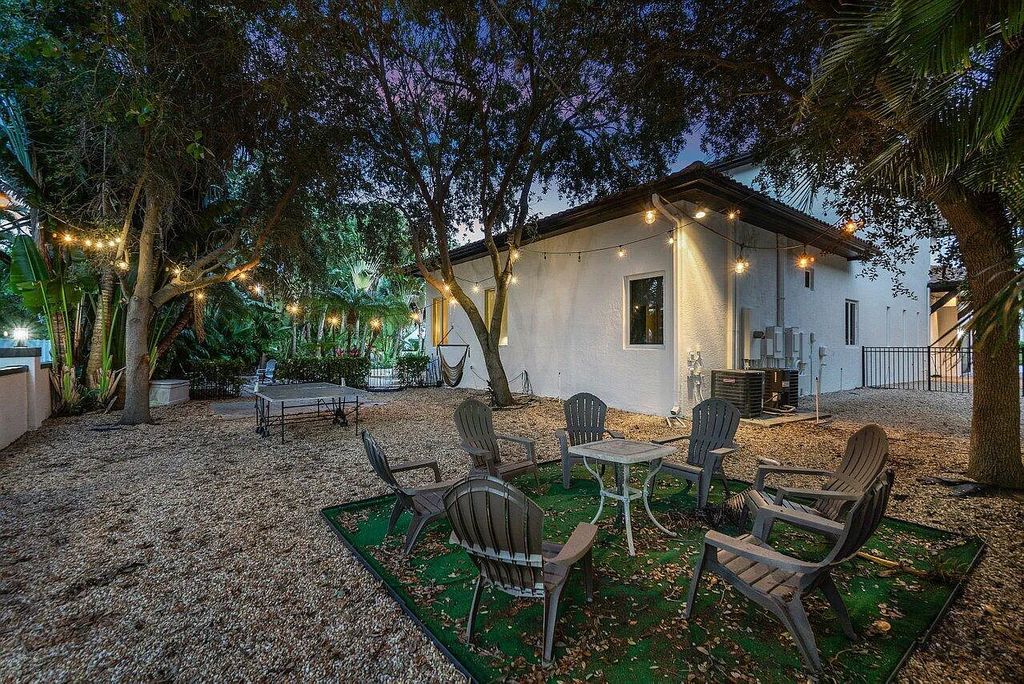 Introducing a stunning house at 14 E Ocean Avenue, located in the highly sought-after area of Boynton Beach, Florida. This luxurious property boasts 6 spacious bedrooms and 7 modern bathrooms, perfect for accommodating large families or hosting guests.