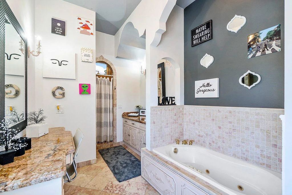 Introducing a stunning house at 14 E Ocean Avenue, located in the highly sought-after area of Boynton Beach, Florida. This luxurious property boasts 6 spacious bedrooms and 7 modern bathrooms, perfect for accommodating large families or hosting guests.