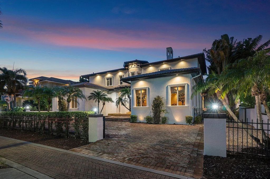 Introducing a stunning house at 14 E Ocean Avenue, located in the highly sought-after area of Boynton Beach, Florida. This luxurious property boasts 6 spacious bedrooms and 7 modern bathrooms, perfect for accommodating large families or hosting guests.