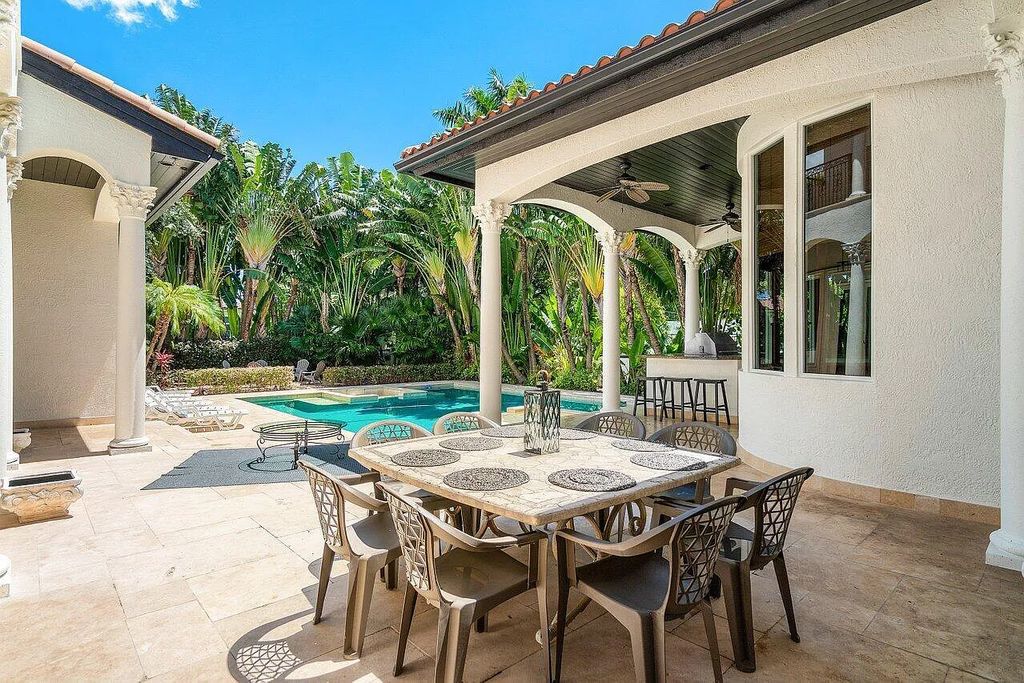 Introducing a stunning house at 14 E Ocean Avenue, located in the highly sought-after area of Boynton Beach, Florida. This luxurious property boasts 6 spacious bedrooms and 7 modern bathrooms, perfect for accommodating large families or hosting guests.