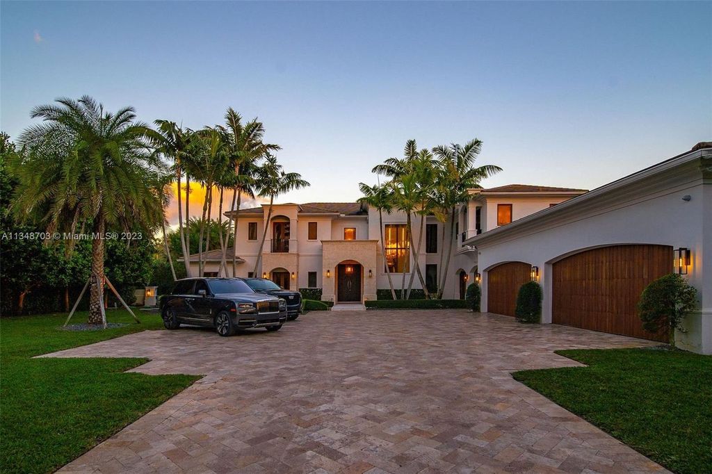 Welcome to 8955 SW 63rd Court in Pinecrest, Florida - an opulent oasis in the sought-after Stritter Estates community. This stunning 6-bedroom, 10-bathroom home boasts over 7,700 square feet of luxurious living space, situated on a sprawling 0.87-acre lot. Built in 2013, this home in Pinecrest is as functional as it is beautiful.