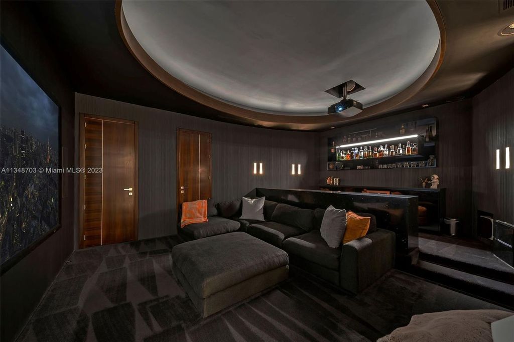 Welcome to 8955 SW 63rd Court in Pinecrest, Florida - an opulent oasis in the sought-after Stritter Estates community. This stunning 6-bedroom, 10-bathroom home boasts over 7,700 square feet of luxurious living space, situated on a sprawling 0.87-acre lot. Built in 2013, this home in Pinecrest is as functional as it is beautiful.
