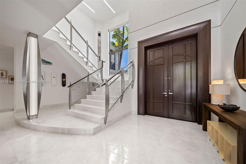 Welcome to 8955 SW 63rd Court in Pinecrest, Florida - an opulent oasis in the sought-after Stritter Estates community. This stunning 6-bedroom, 10-bathroom home boasts over 7,700 square feet of luxurious living space, situated on a sprawling 0.87-acre lot. Built in 2013, this home in Pinecrest is as functional as it is beautiful.