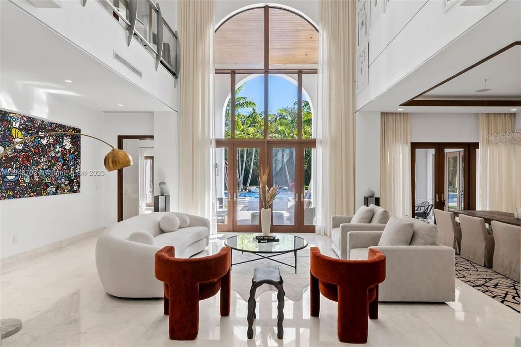 Welcome to 8955 SW 63rd Court in Pinecrest, Florida - an opulent oasis in the sought-after Stritter Estates community. This stunning 6-bedroom, 10-bathroom home boasts over 7,700 square feet of luxurious living space, situated on a sprawling 0.87-acre lot. Built in 2013, this home in Pinecrest is as functional as it is beautiful.