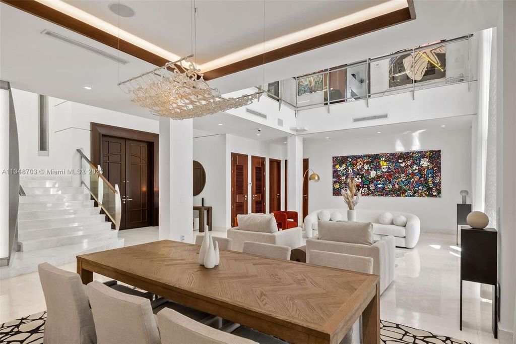 Welcome to 8955 SW 63rd Court in Pinecrest, Florida - an opulent oasis in the sought-after Stritter Estates community. This stunning 6-bedroom, 10-bathroom home boasts over 7,700 square feet of luxurious living space, situated on a sprawling 0.87-acre lot. Built in 2013, this home in Pinecrest is as functional as it is beautiful.