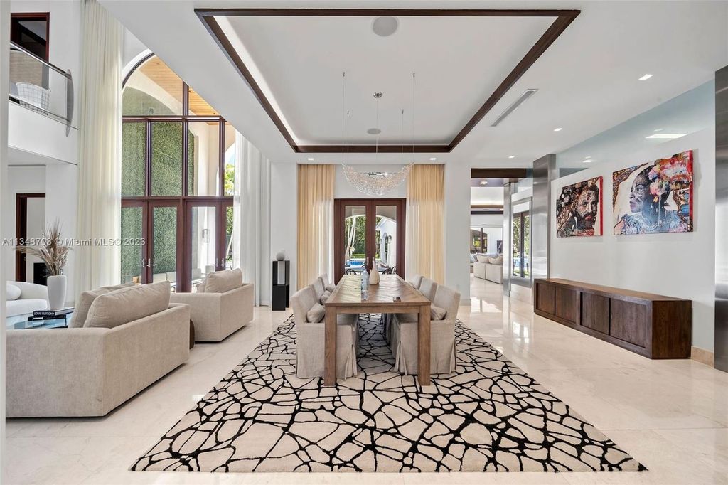 Welcome to 8955 SW 63rd Court in Pinecrest, Florida - an opulent oasis in the sought-after Stritter Estates community. This stunning 6-bedroom, 10-bathroom home boasts over 7,700 square feet of luxurious living space, situated on a sprawling 0.87-acre lot. Built in 2013, this home in Pinecrest is as functional as it is beautiful.