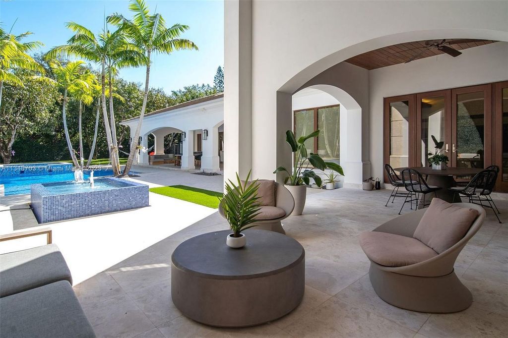 Welcome to 8955 SW 63rd Court in Pinecrest, Florida - an opulent oasis in the sought-after Stritter Estates community. This stunning 6-bedroom, 10-bathroom home boasts over 7,700 square feet of luxurious living space, situated on a sprawling 0.87-acre lot. Built in 2013, this home in Pinecrest is as functional as it is beautiful.