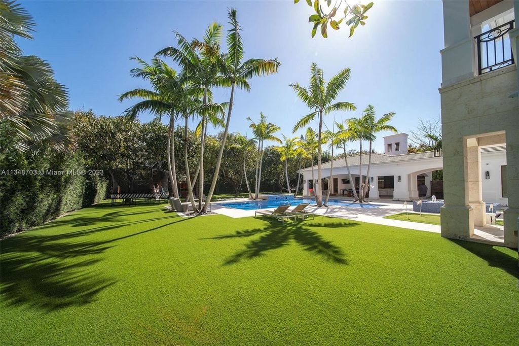 Welcome to 8955 SW 63rd Court in Pinecrest, Florida - an opulent oasis in the sought-after Stritter Estates community. This stunning 6-bedroom, 10-bathroom home boasts over 7,700 square feet of luxurious living space, situated on a sprawling 0.87-acre lot. Built in 2013, this home in Pinecrest is as functional as it is beautiful.