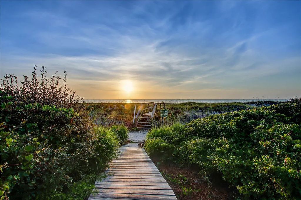 Welcome to 4 Dunes Ct, Fernandina Beach, Florida – a stunning, private, and truly one-of-a-kind Mediterranean-style estate with breathtaking views of the Atlantic Ocean!