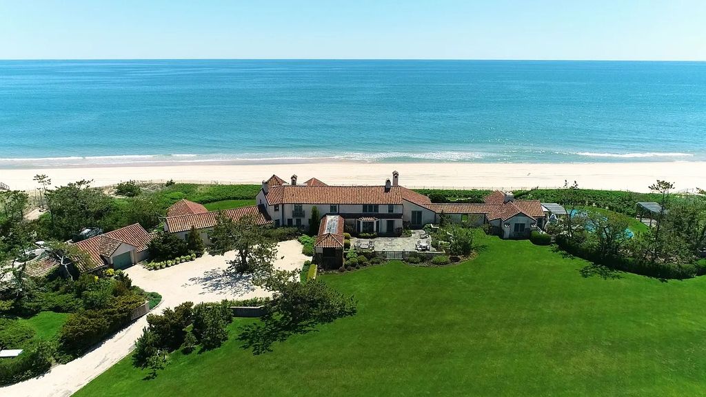 The House in East Hampton includes oceanside pool, extensive terraces and second floor deck taking full advantage of the panoramic views now available for sale. This home located at 201 Lily Pond Ln, East Hampton, New York