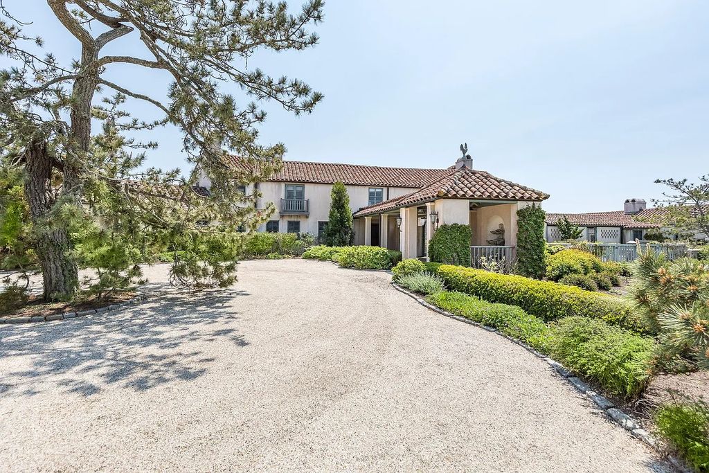 The House in East Hampton includes oceanside pool, extensive terraces and second floor deck taking full advantage of the panoramic views now available for sale. This home located at 201 Lily Pond Ln, East Hampton, New York