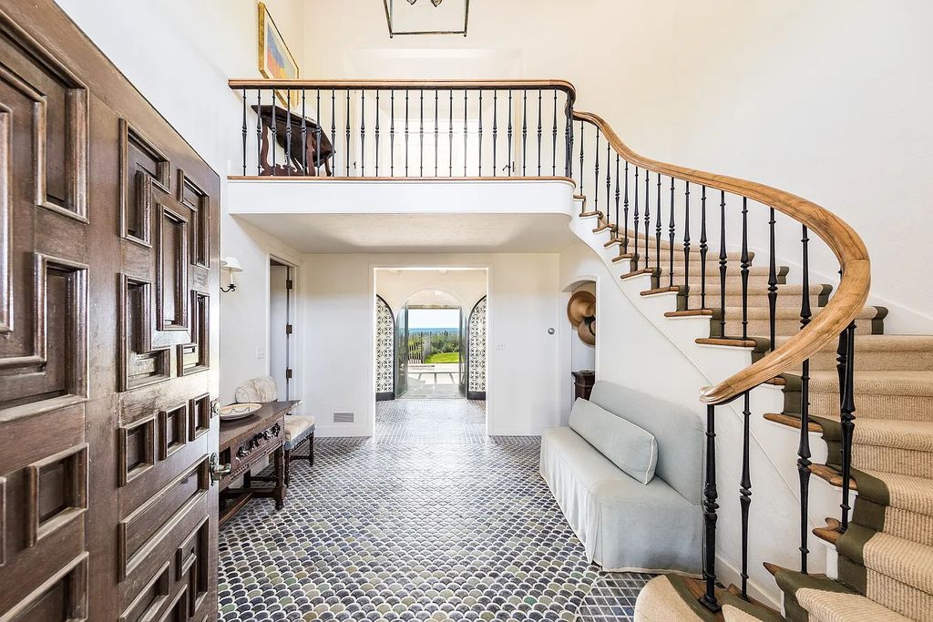 The House in East Hampton includes oceanside pool, extensive terraces and second floor deck taking full advantage of the panoramic views now available for sale. This home located at 201 Lily Pond Ln, East Hampton, New York