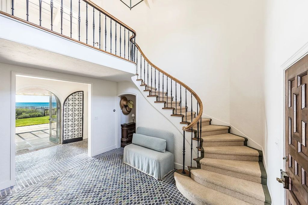 The House in East Hampton includes oceanside pool, extensive terraces and second floor deck taking full advantage of the panoramic views now available for sale. This home located at 201 Lily Pond Ln, East Hampton, New York