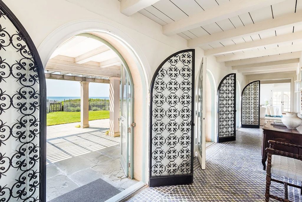 The House in East Hampton includes oceanside pool, extensive terraces and second floor deck taking full advantage of the panoramic views now available for sale. This home located at 201 Lily Pond Ln, East Hampton, New York