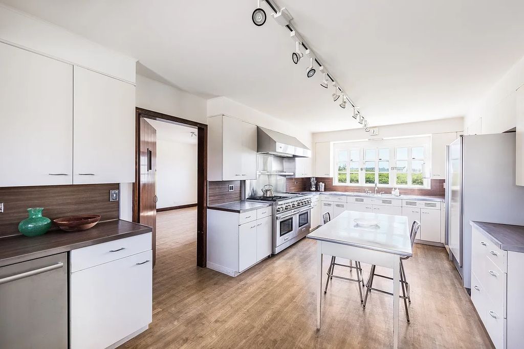 The House in East Hampton includes oceanside pool, extensive terraces and second floor deck taking full advantage of the panoramic views now available for sale. This home located at 201 Lily Pond Ln, East Hampton, New York