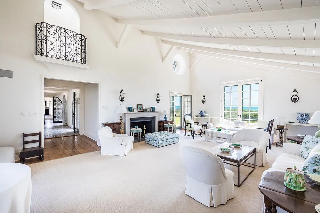 The House in East Hampton includes oceanside pool, extensive terraces and second floor deck taking full advantage of the panoramic views now available for sale. This home located at 201 Lily Pond Ln, East Hampton, New York